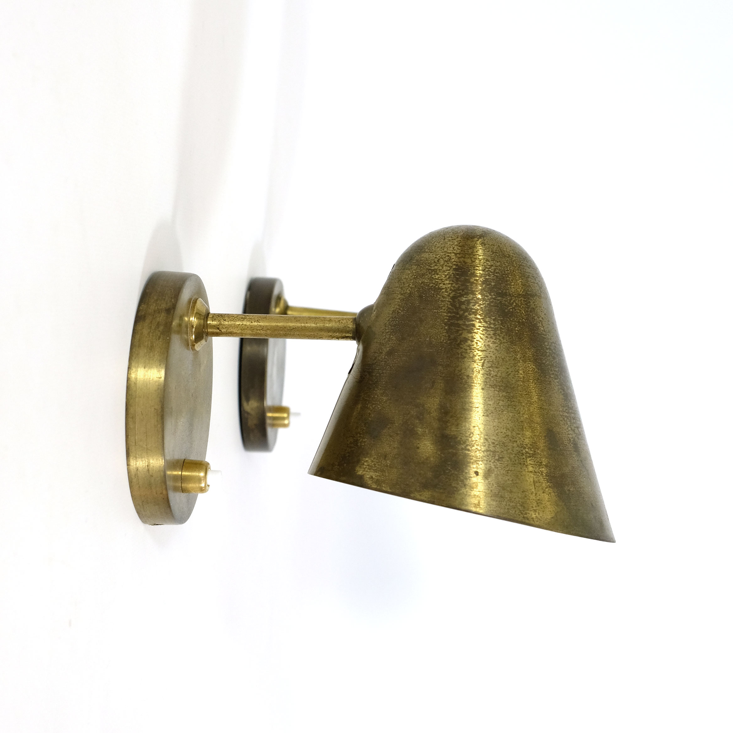 Pair of brass wall mounted lamps from the 1950’s.