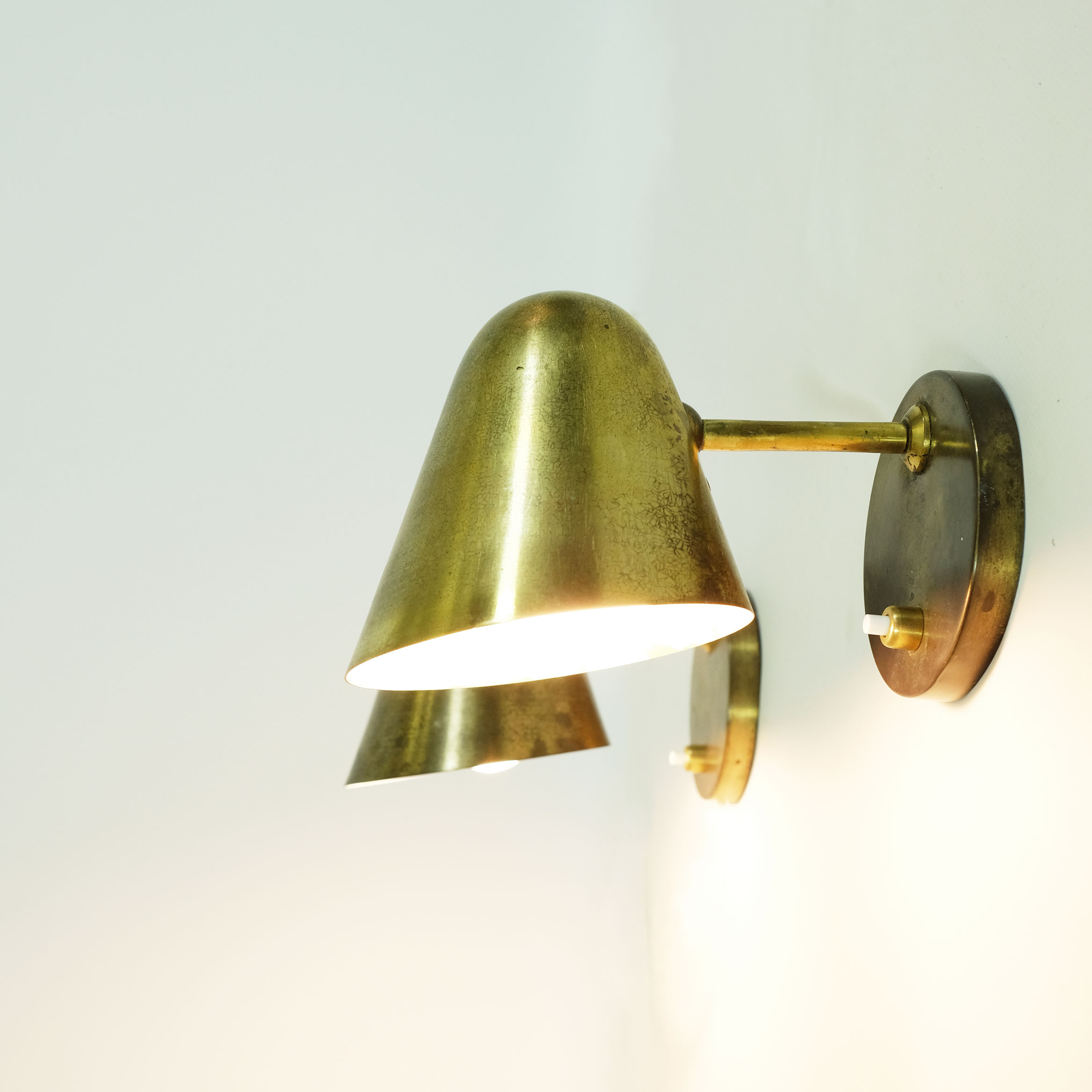 Pair of brass wall mounted lamps from the 1950’s.