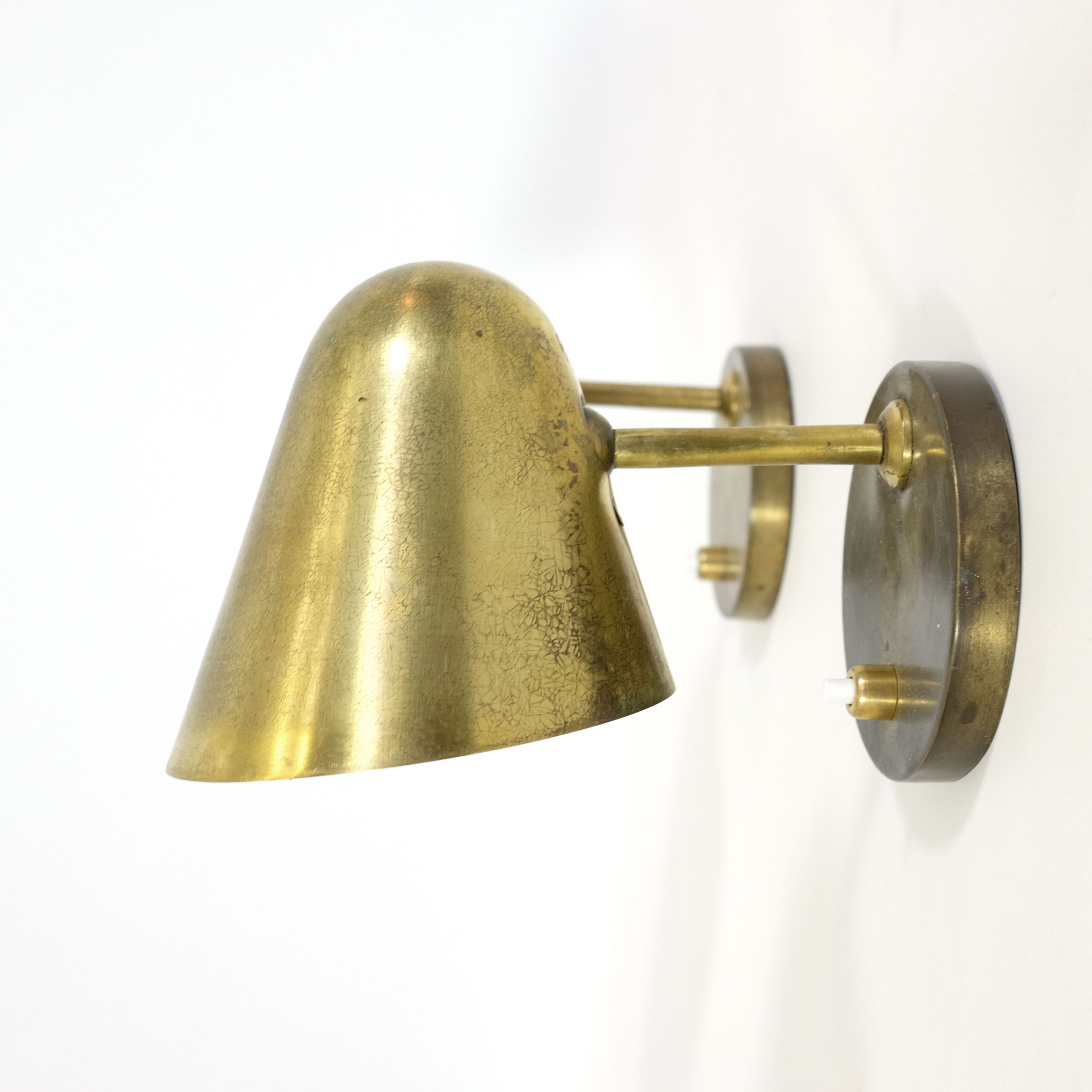 Pair of brass wall mounted lamps from the 1950’s.