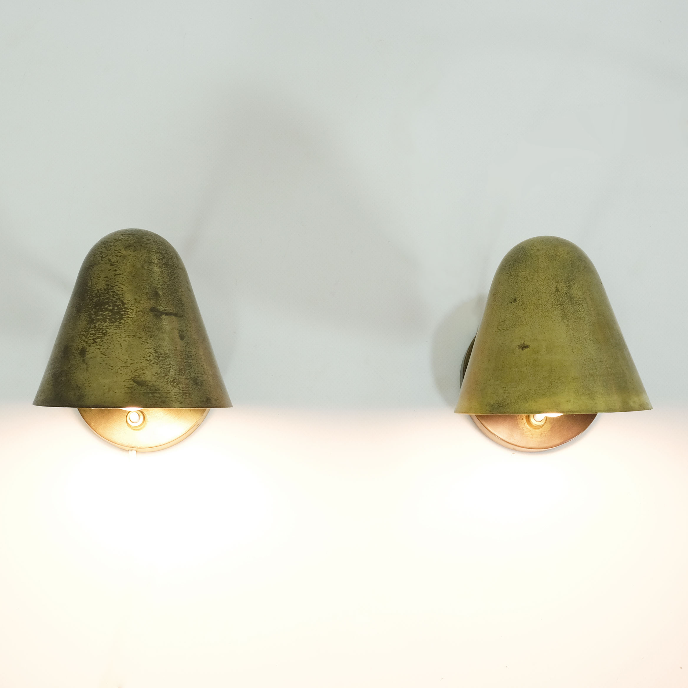 Pair of brass wall mounted lamps from the 1950’s.