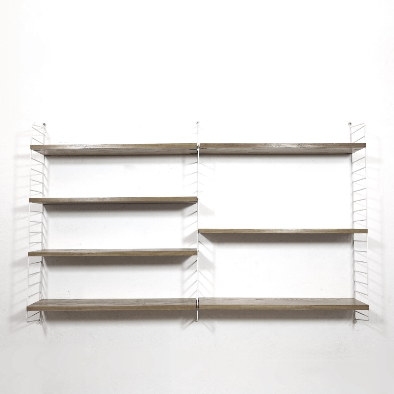 String wall unit designed in the fifties. — LampAndCo