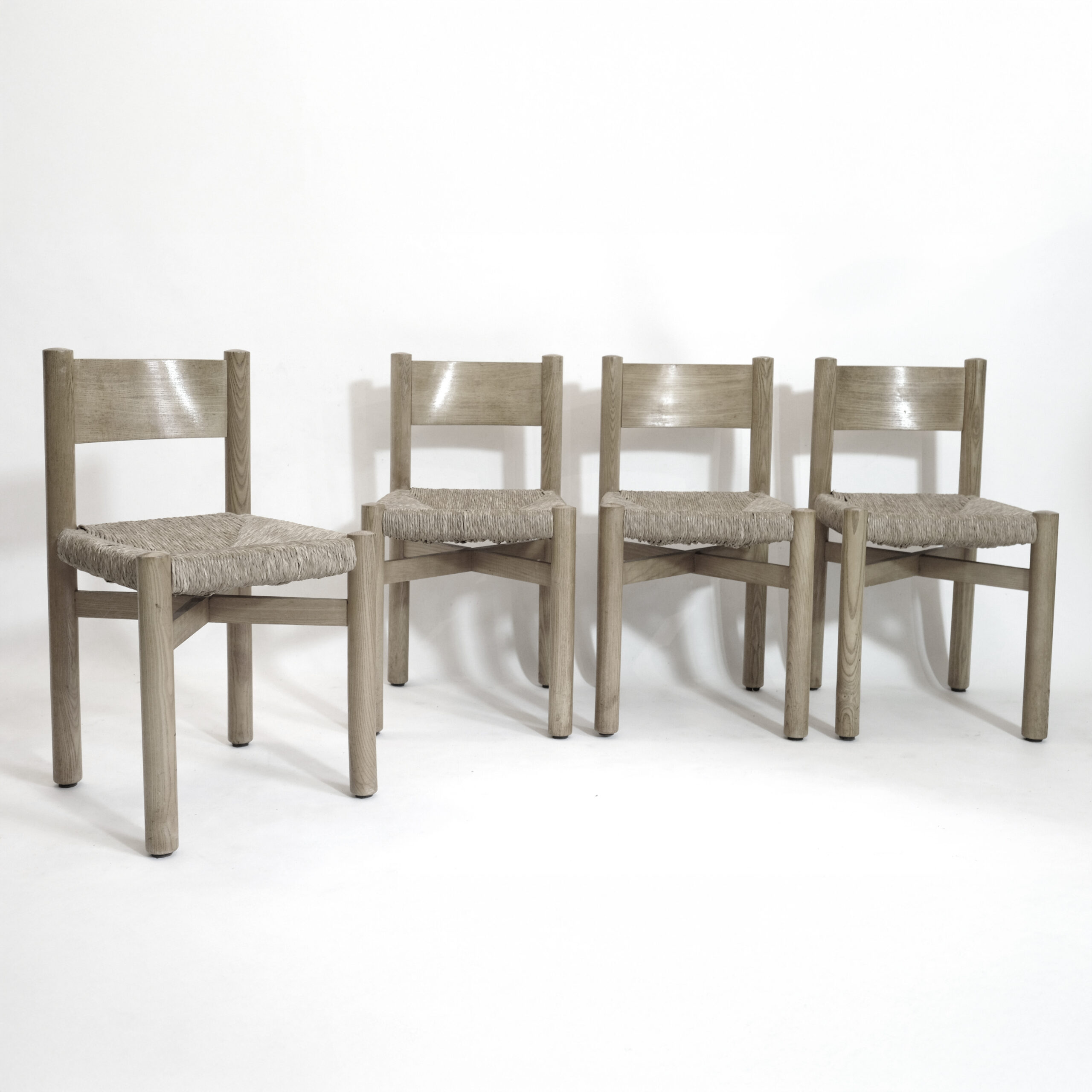 Suite de 4 chaises Courchevel par Charlotte Perriand, 1960s.