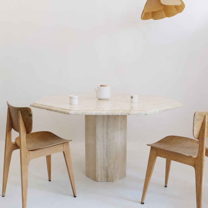 Octogonal travertine dining table from the seventies.