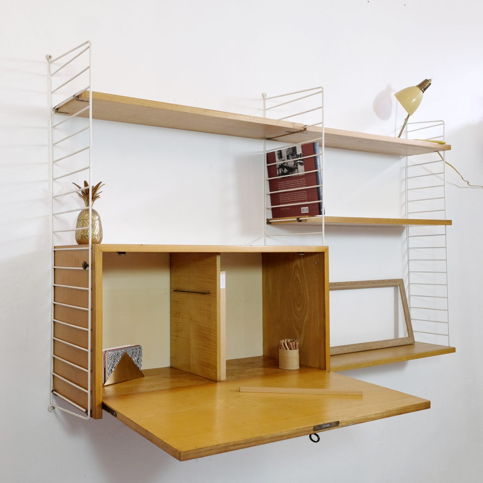 Kajsa & Nisse Strinning, String modular wall unit. — LampAndCo