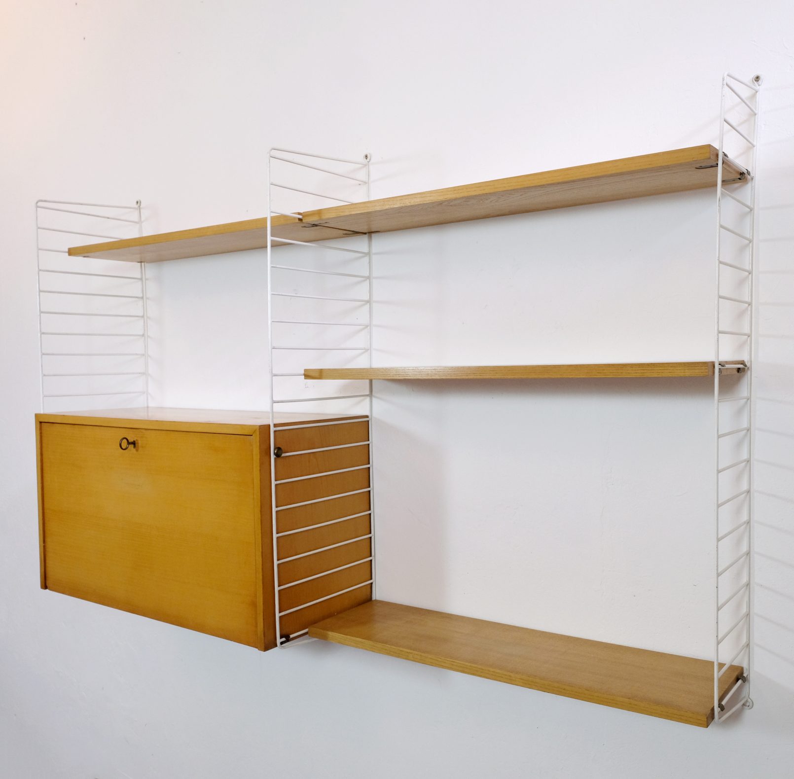 Kajsa & Nisse Strinning, String modular wall unit. — LampAndCo