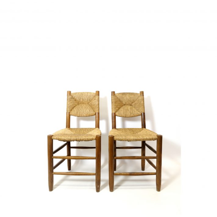 Charlotte Perriand, a pair of chairs n°19, design of 1939.
