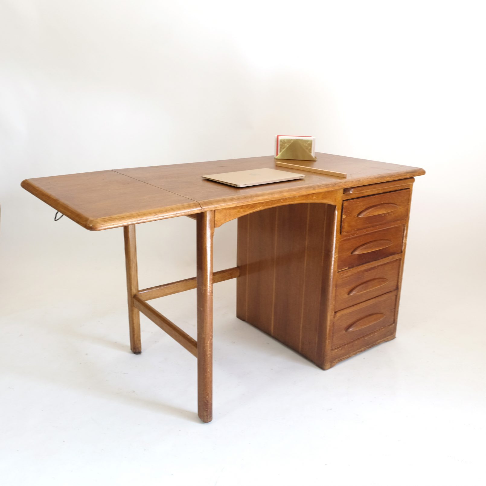 Desk with an extending leaf from the fifties.