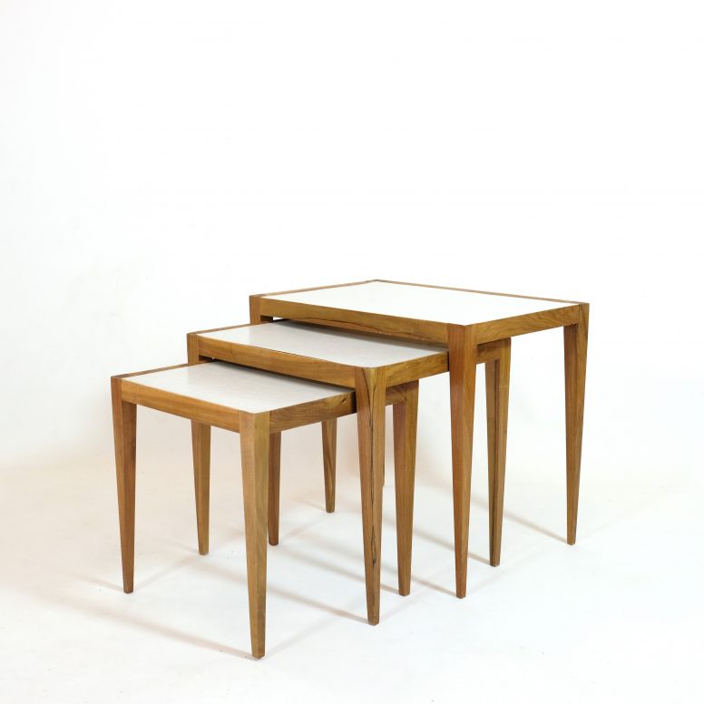 Three Swiss nesting tables from the sixties.