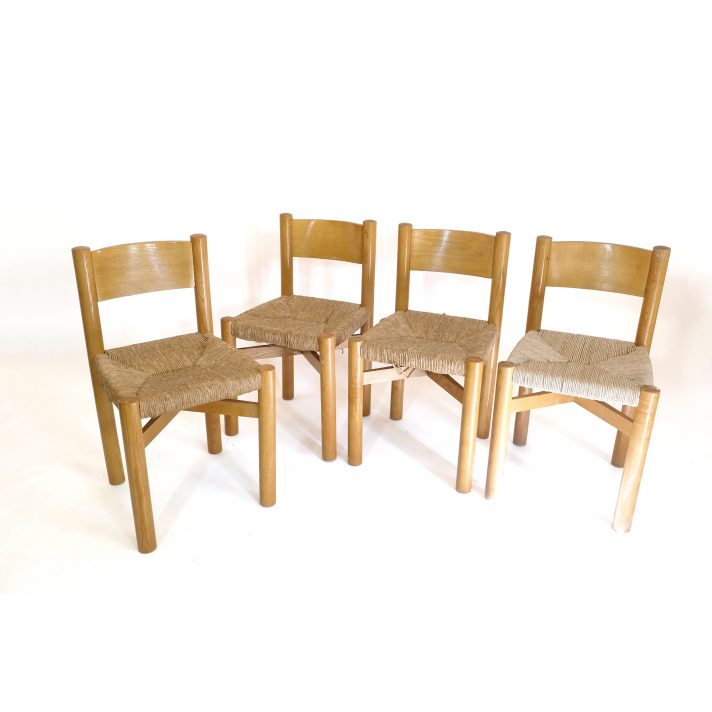 Suite de 4 chaises Méribel par Charlotte Perriand, 1950s.