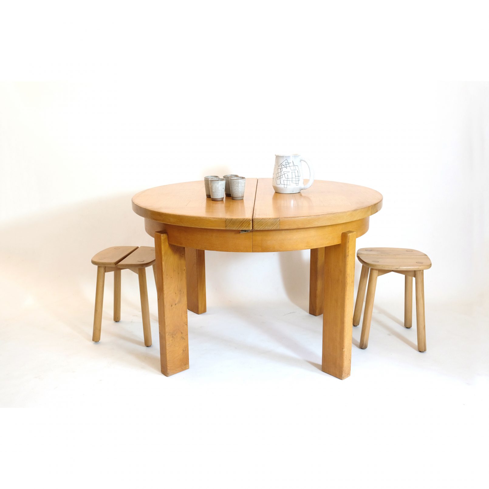 Maison Regain, dining table with an extending leaf, 1970s.
