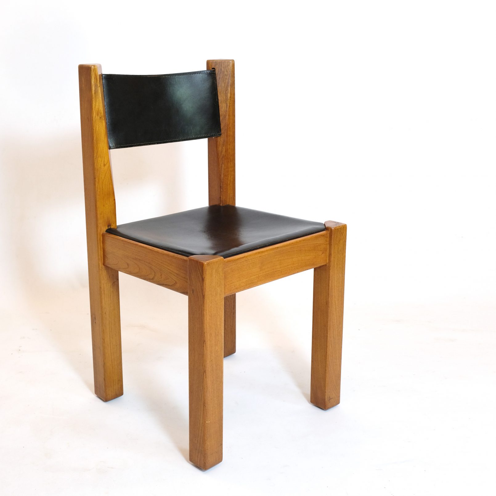 De l’Orme Editeur, solid elm and leather chair, 1970s.