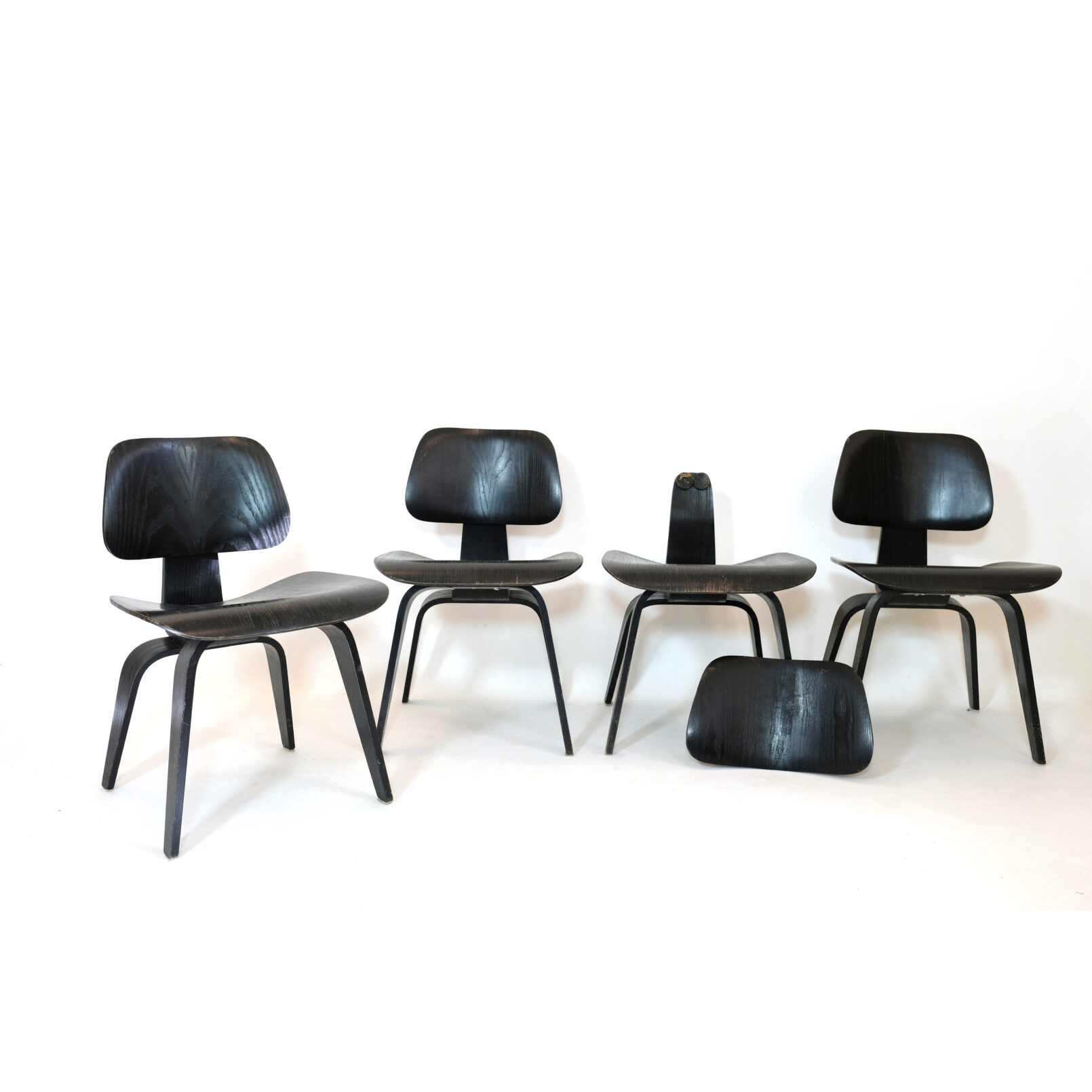 Charles and Ray Eames, set of 4 DCW chairs to be restored.