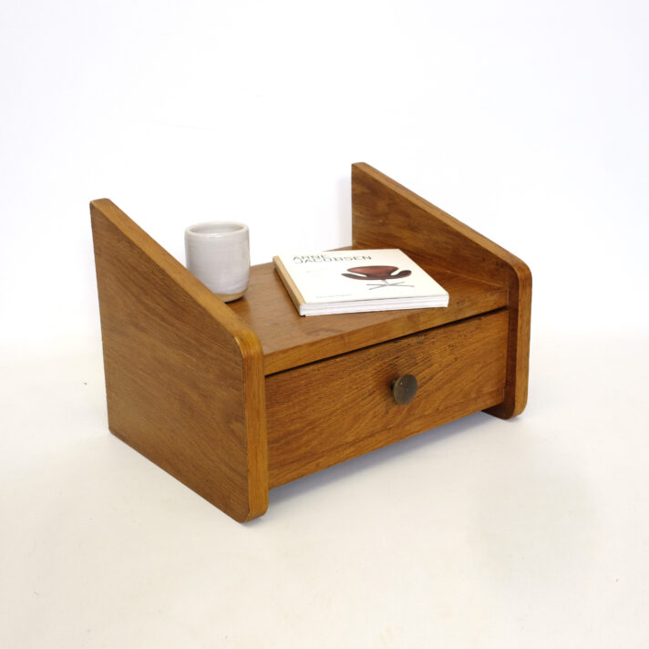 Wall mounted bedside table with a drawer, 1950s.