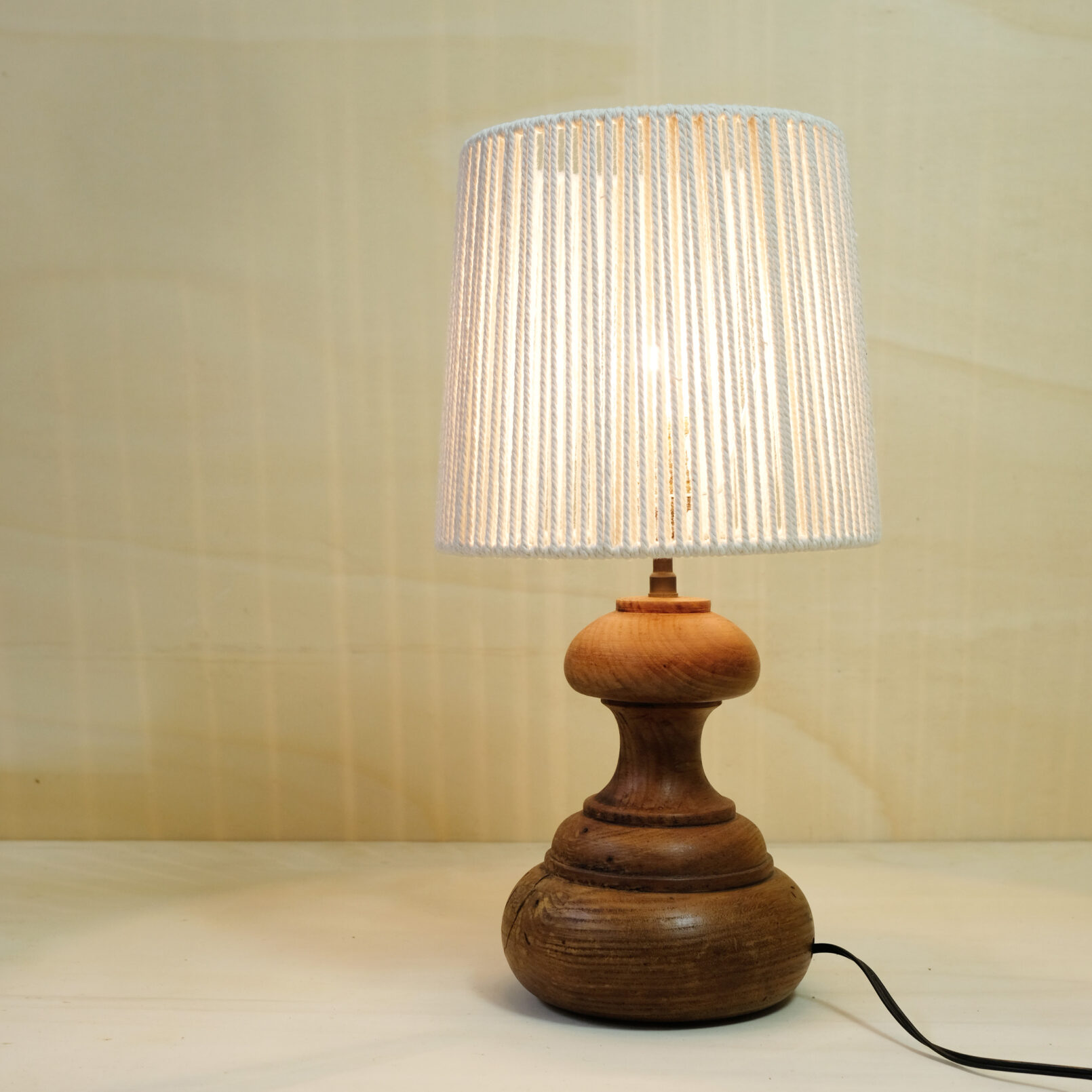 Table lamp with a turned wooden base, 1960-1970.