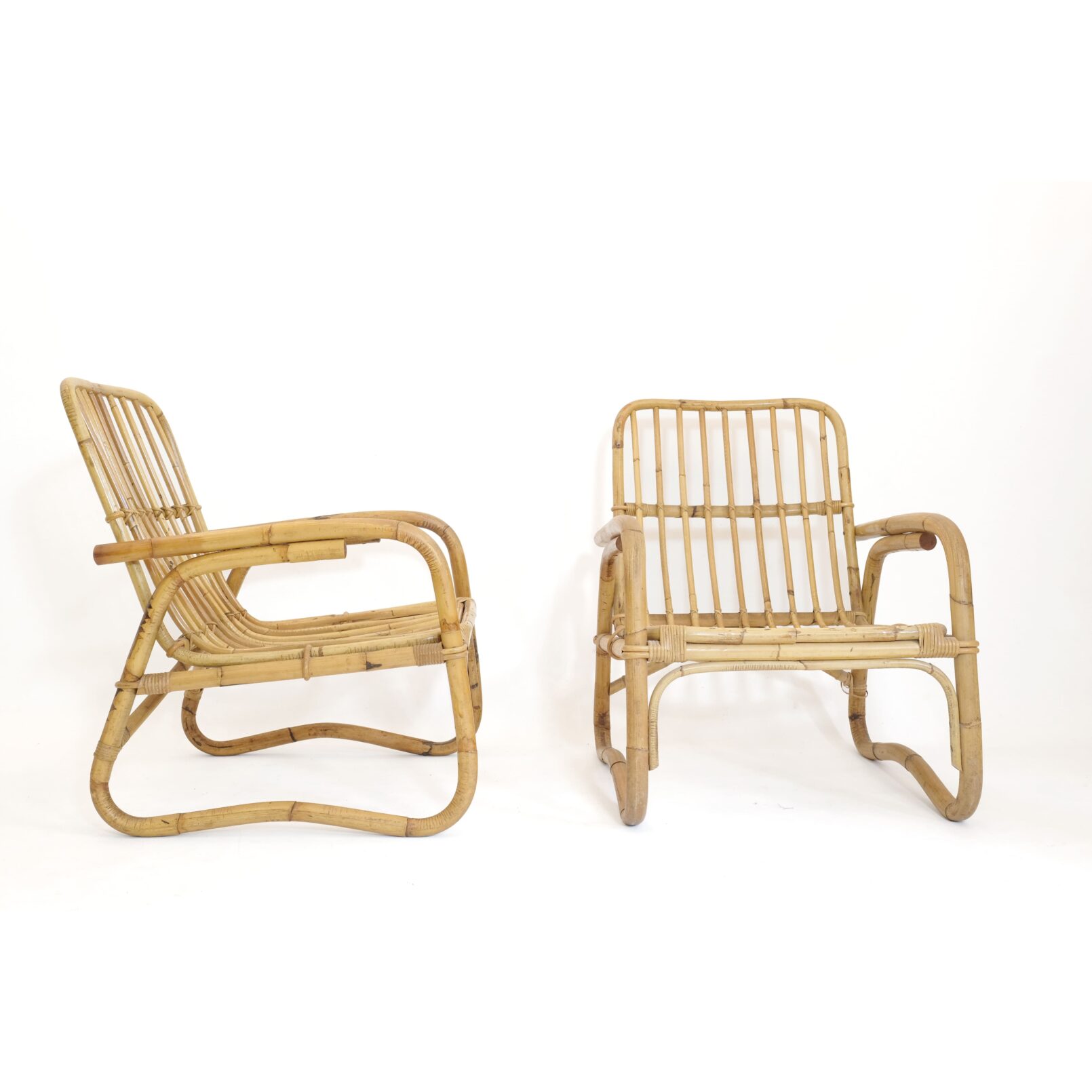 Pair of large Italian rattan lounge chairs from the 1960s.