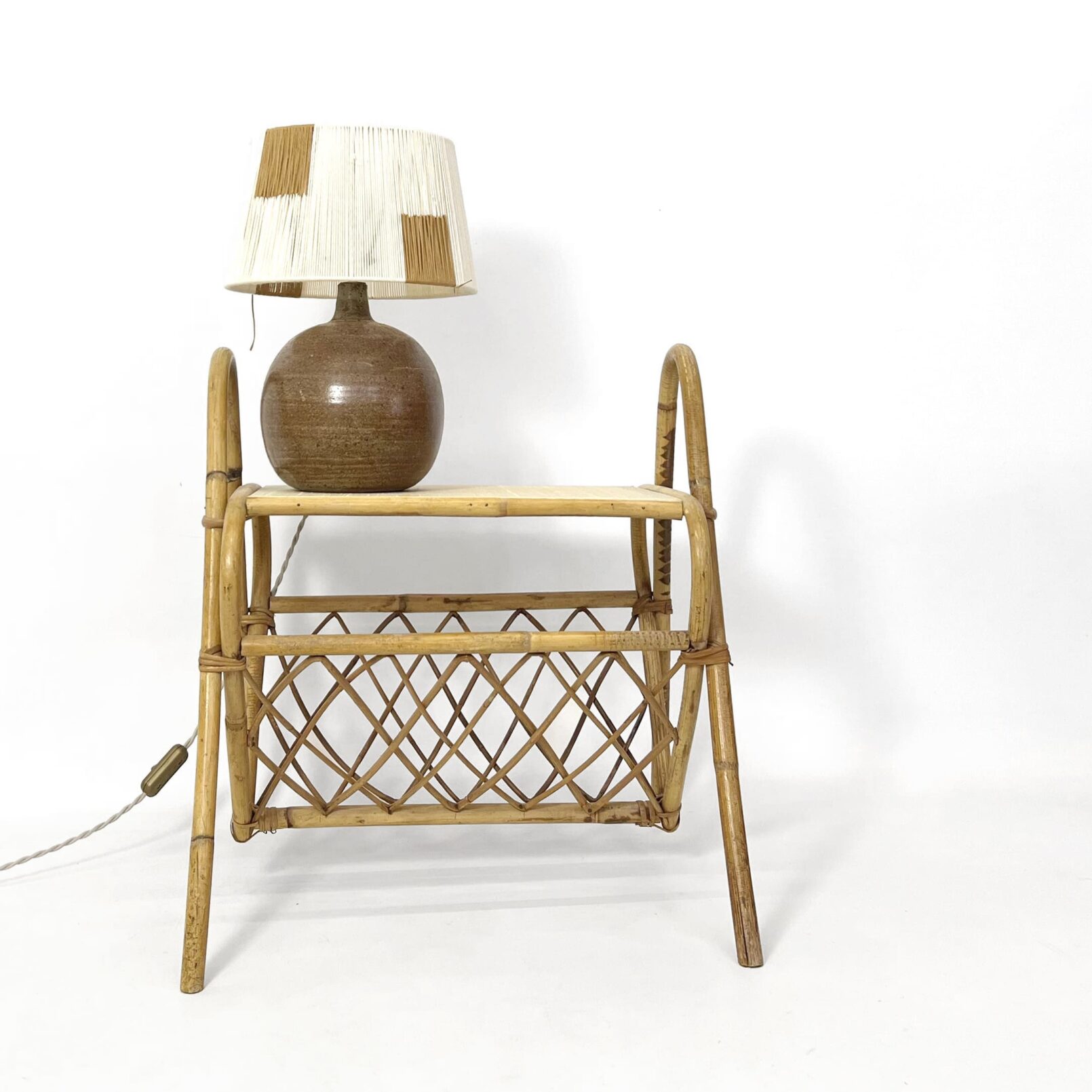 French rattan bedside table from the 1960’s-1970’s.