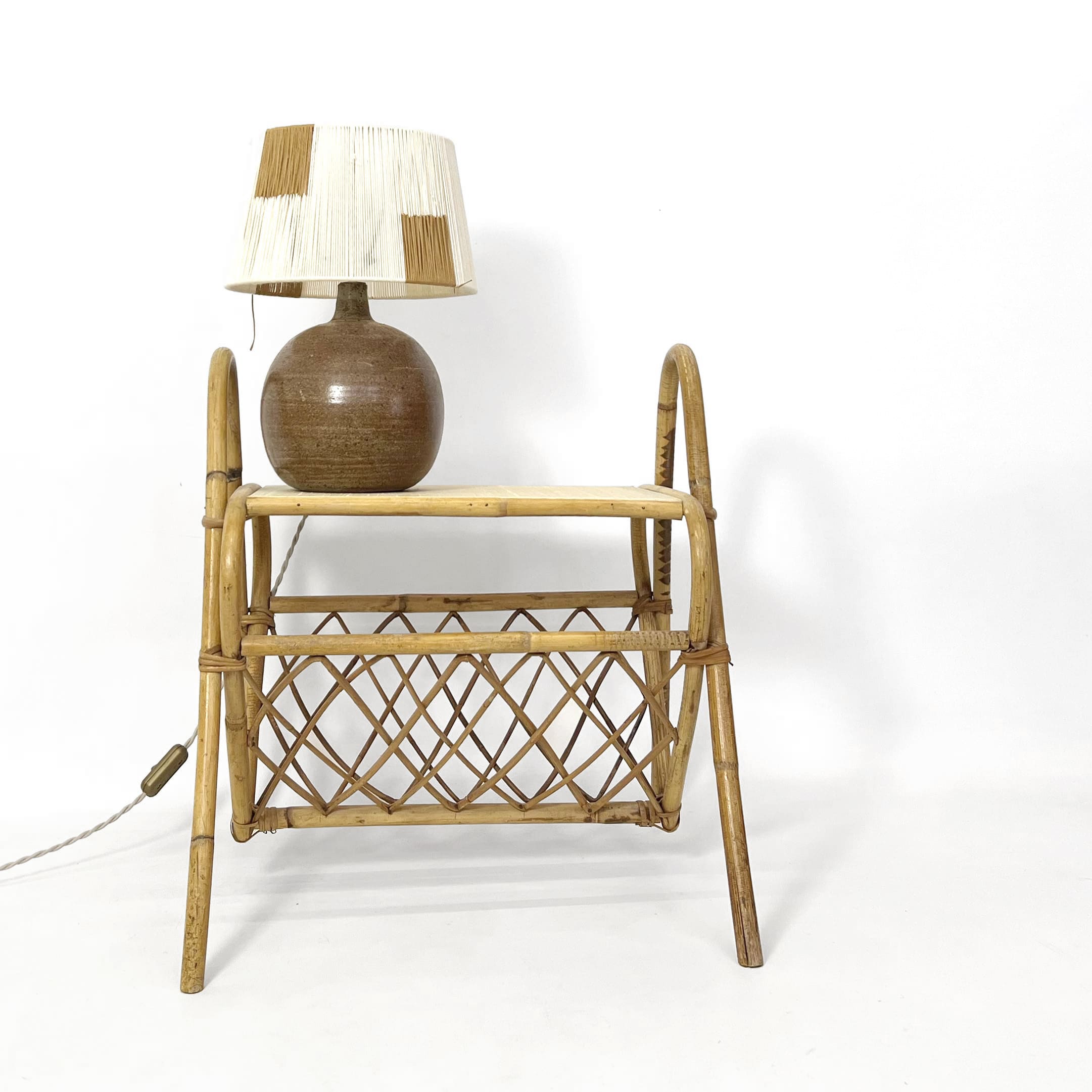 French rattan bedside table from the 1960’s-1970’s.