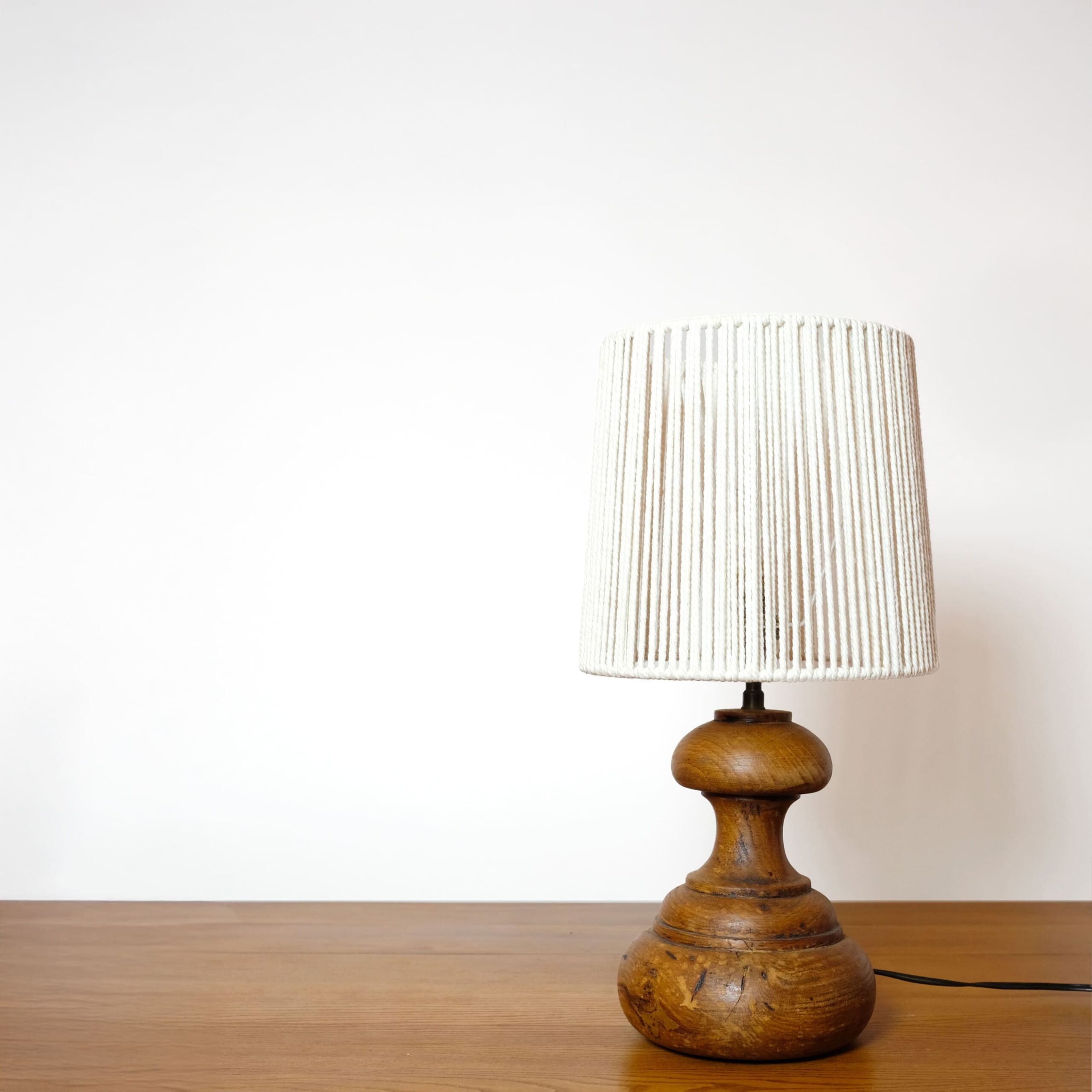 Table lamp with a turned wooden base, 1960-1970.