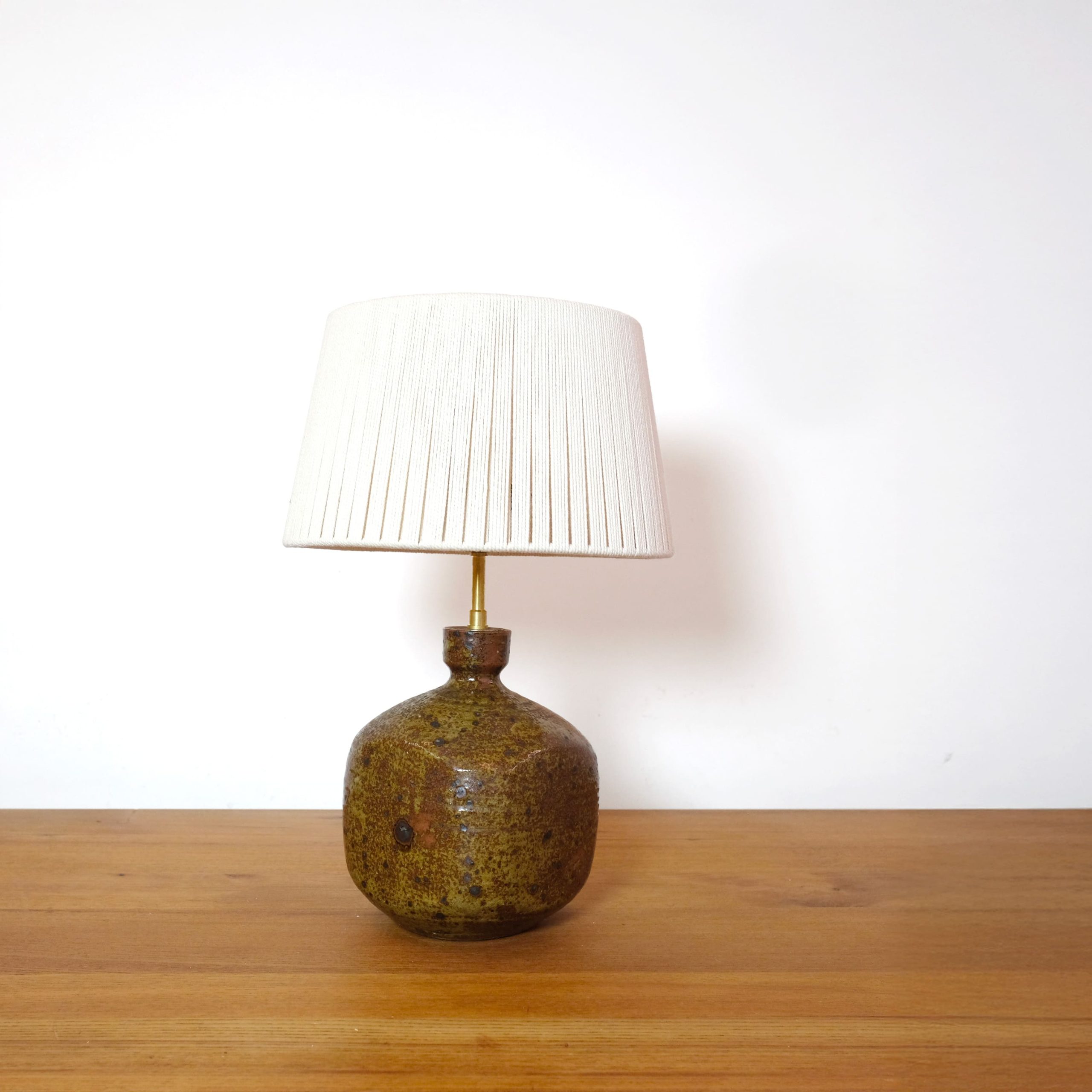 Square-based stoneware lamp with its cotton rope shade.