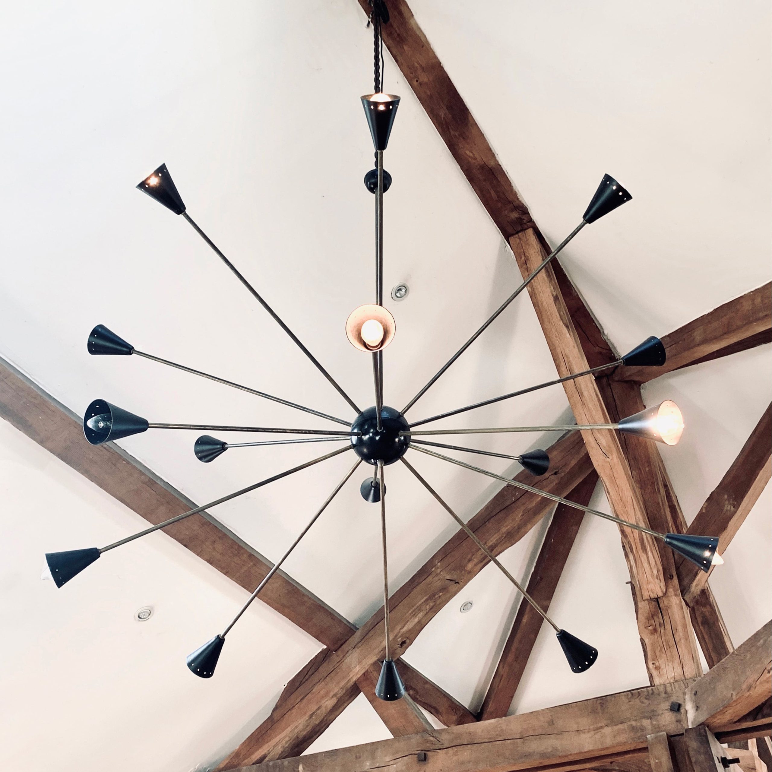 Large Italian 16-light ceiling lamp.