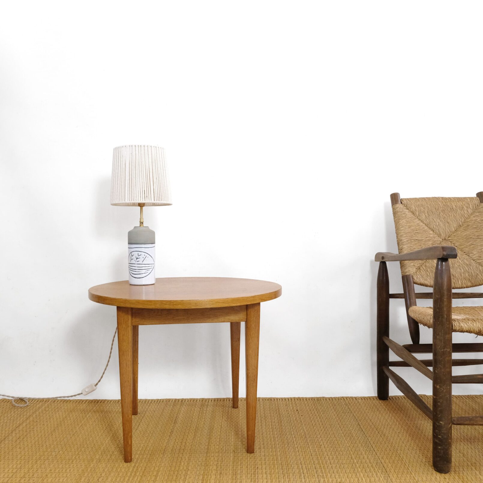 Round coffee table in light wood, 1960s–1970s.